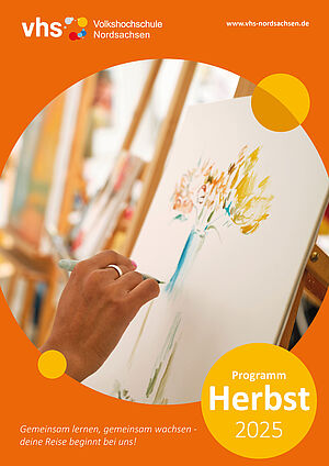 Titel des Programmheftes: Eine weibliche Hand zeichnet ein Bild